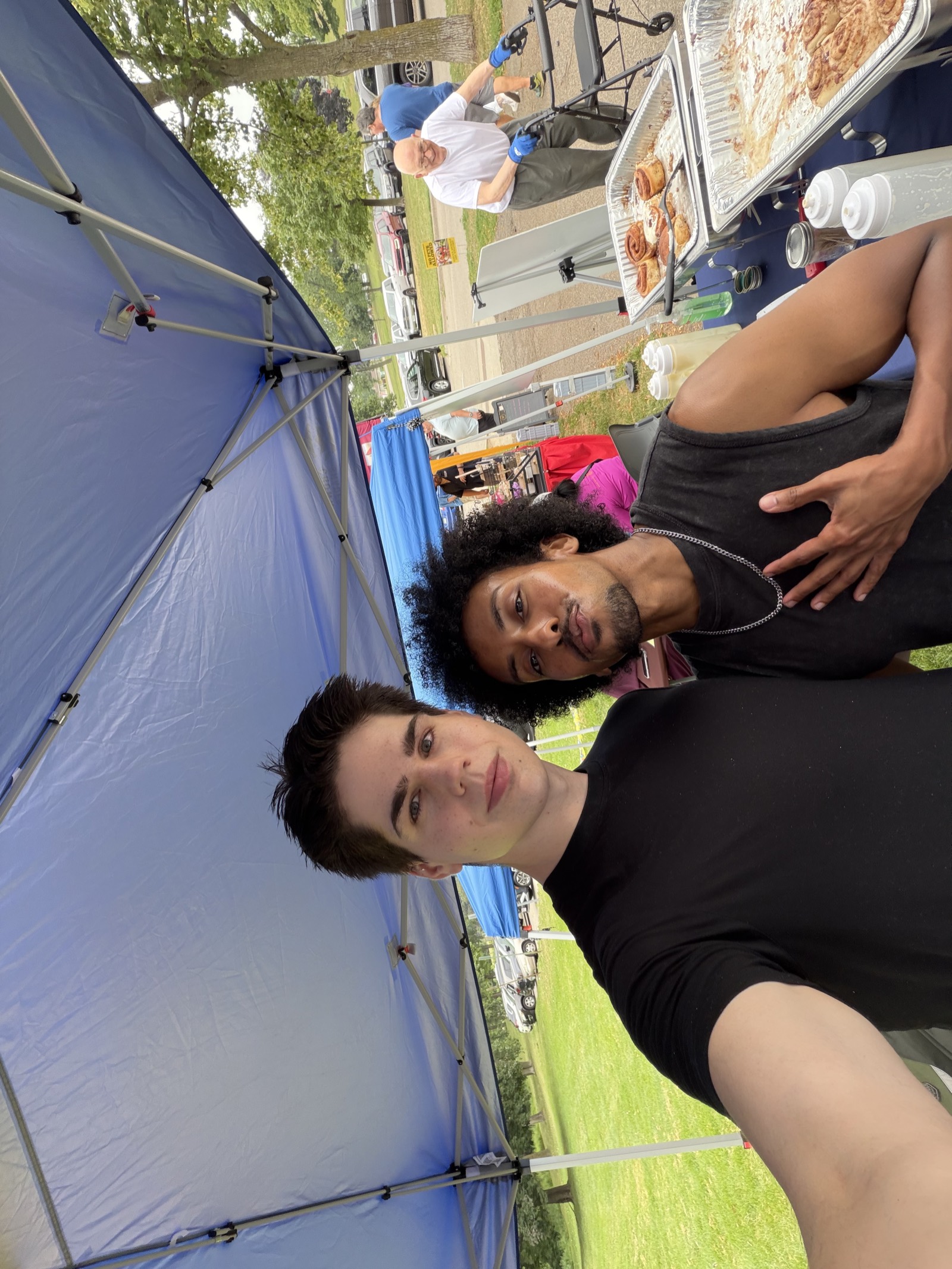 tommy and omar together at the tandoco farmers-market booth
